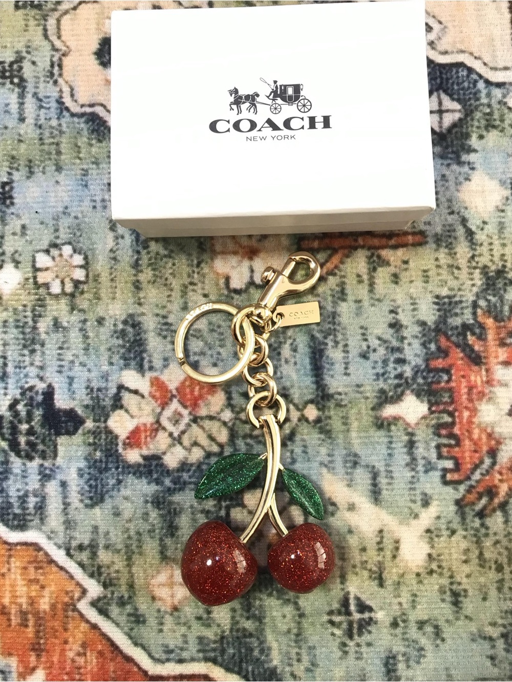 Coach Gold-Tone Cherry Keychain with Red Glitter Cherries and Green Leaves